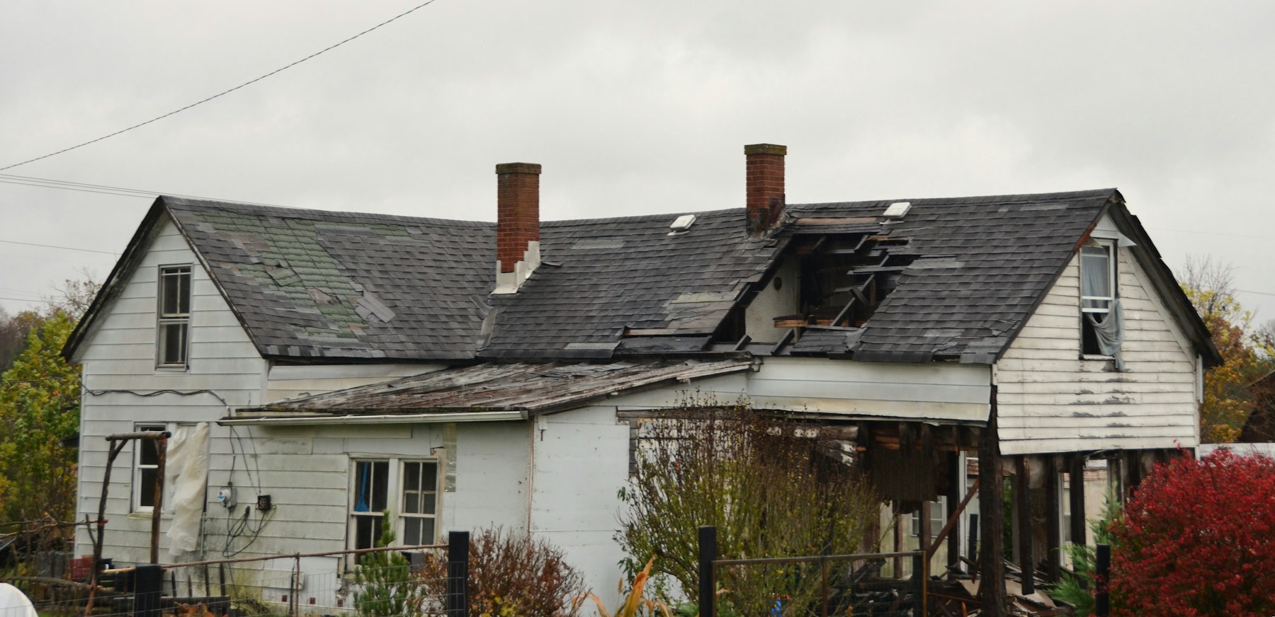 House with fire damage to the roof