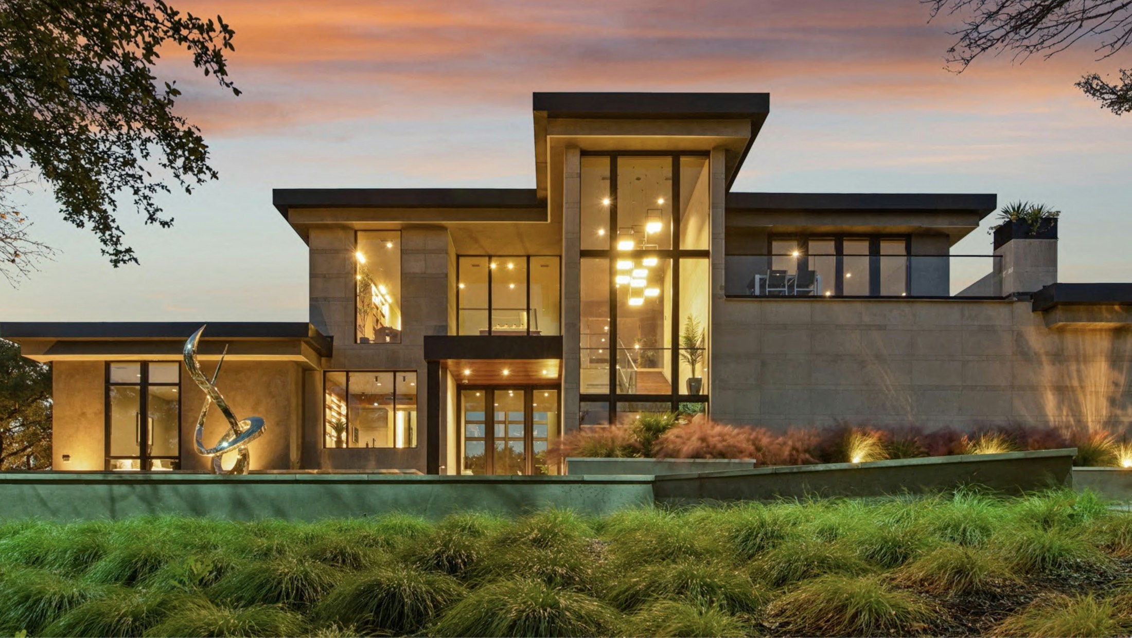 Modern home exterior at sunset